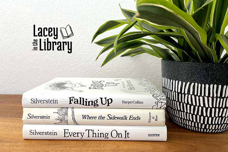 A table displays three books by Shel Silverstein and a vibrant plant, creating a cozy reading atmosphere.