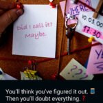 String connecting images on a cork board.
